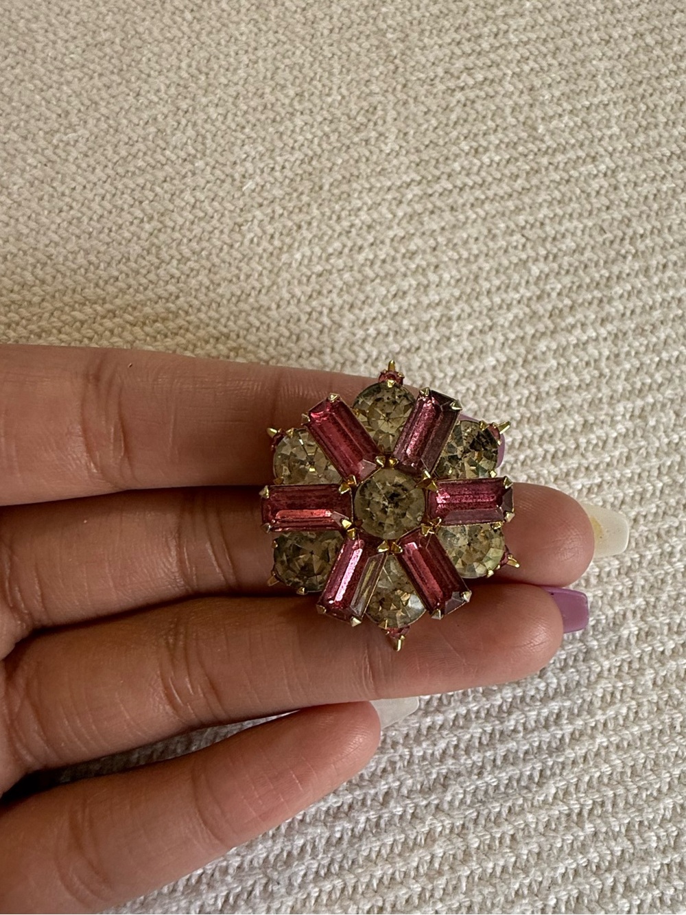 Mid-Century Modern vintage pink baguette rhinestone starburst brooch.